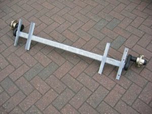 AXLE 600KG GROSS UNBRAKED 4X4PCD 1360ohf 750mbc angle iron mounting brackets 792mm between angle iron